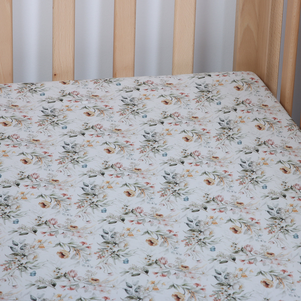 fitted cot sheet in floral print used in amara cot