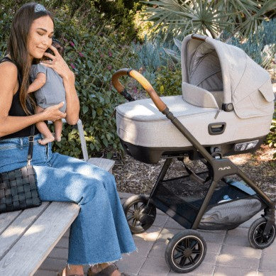 Nuna Cari Next Biscotti attached on a stroller