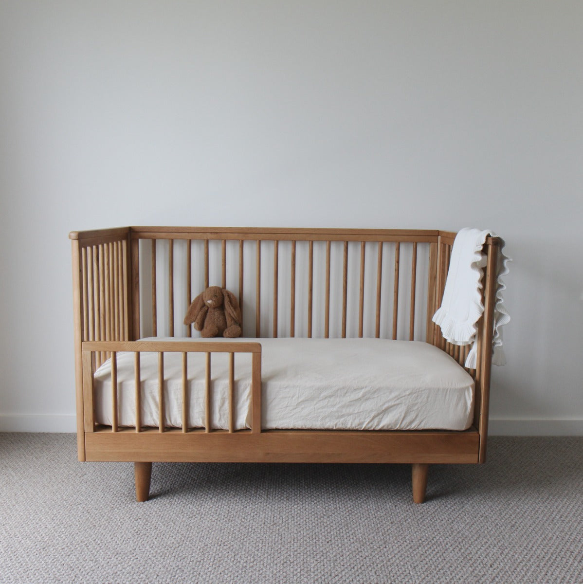 George Toddler Bed conversion kit attached in bed