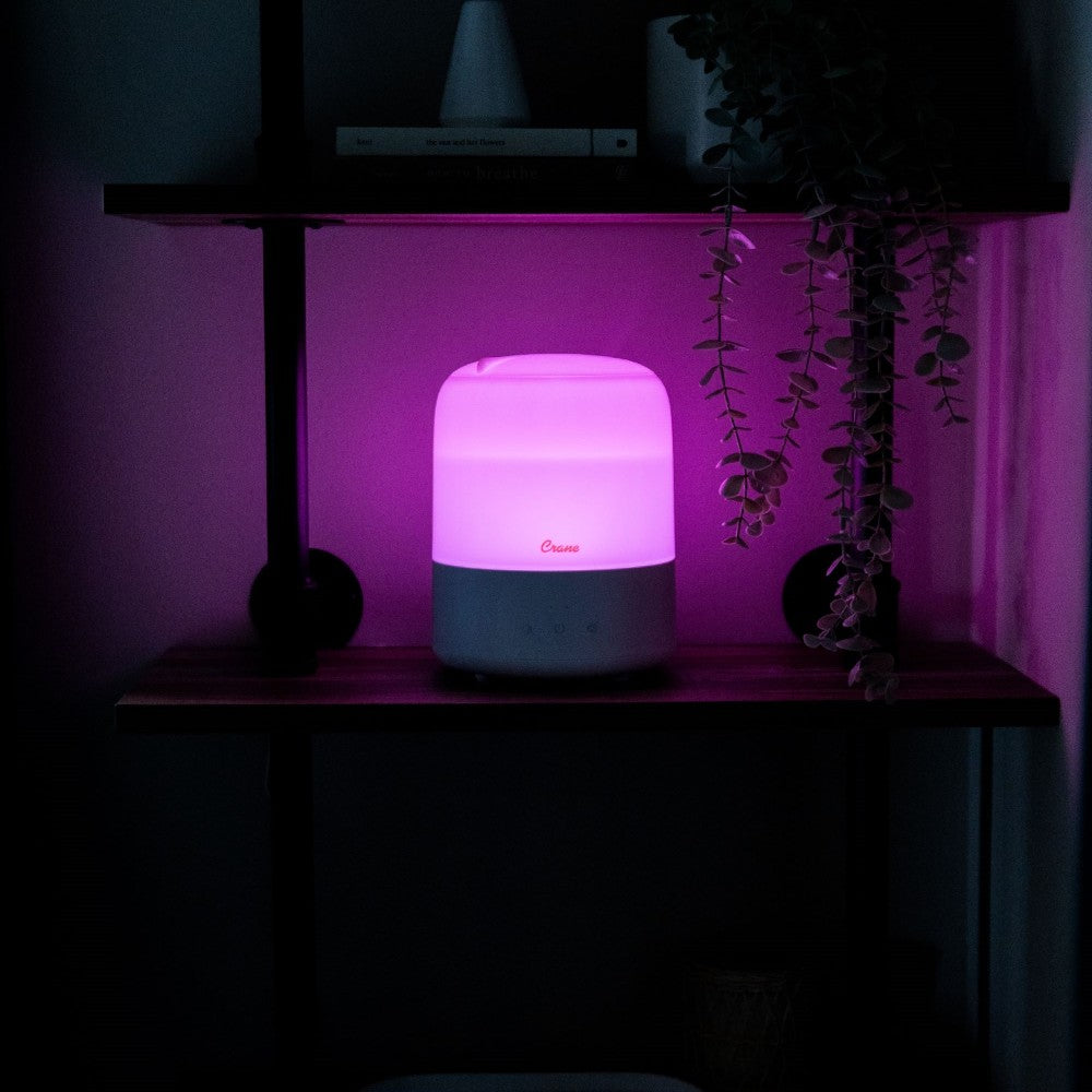 Crane Dehumidifier in a bedroom with pink light