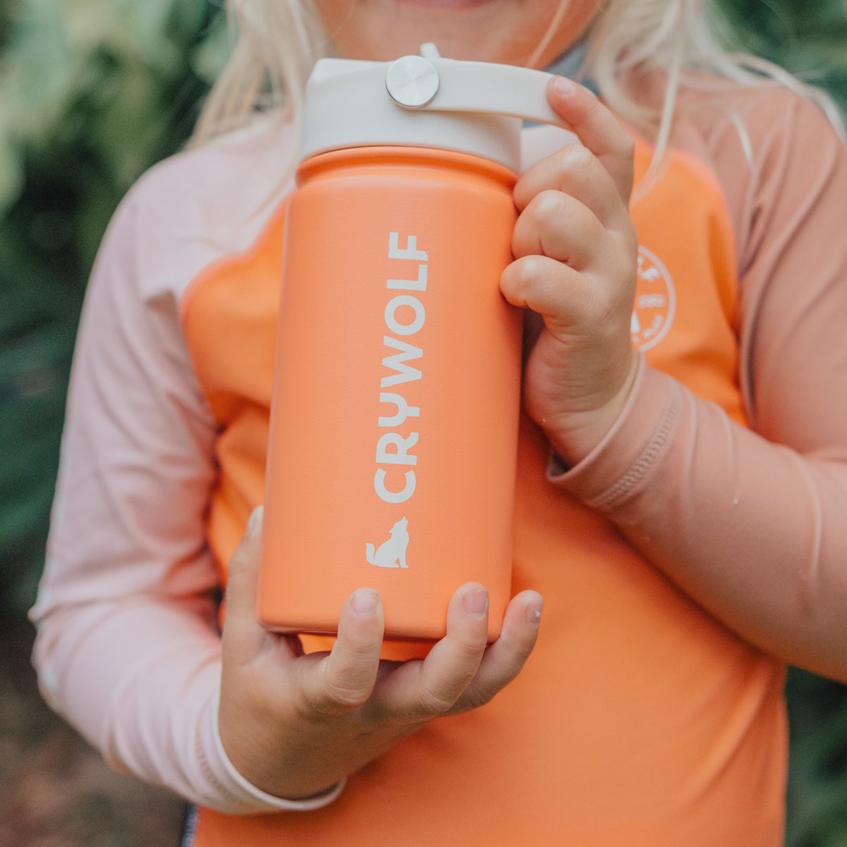 Little girl holding Crywolf Coral Drink Bottle 400ml