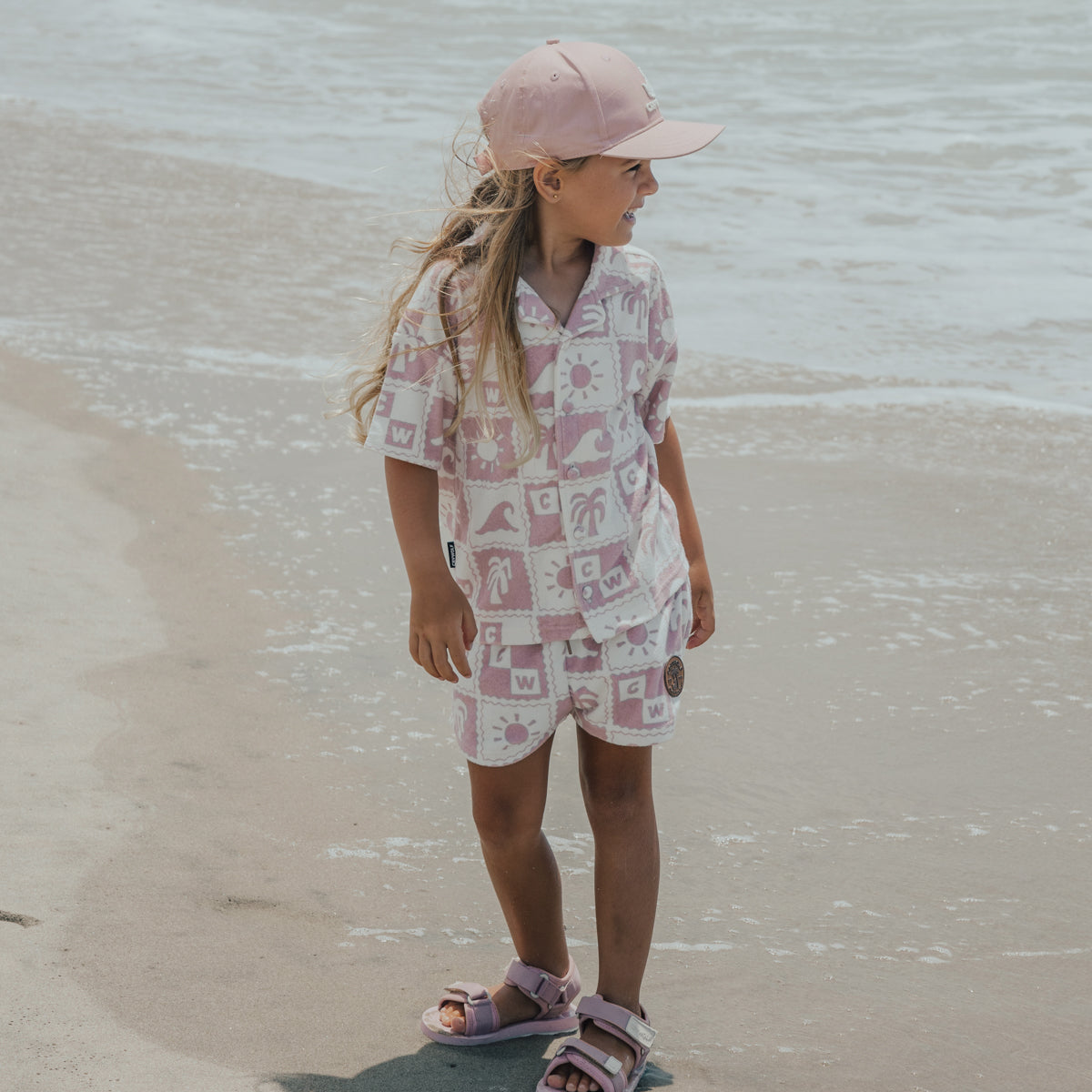 Girl wearing Cry Wolf resort set Blush Check
