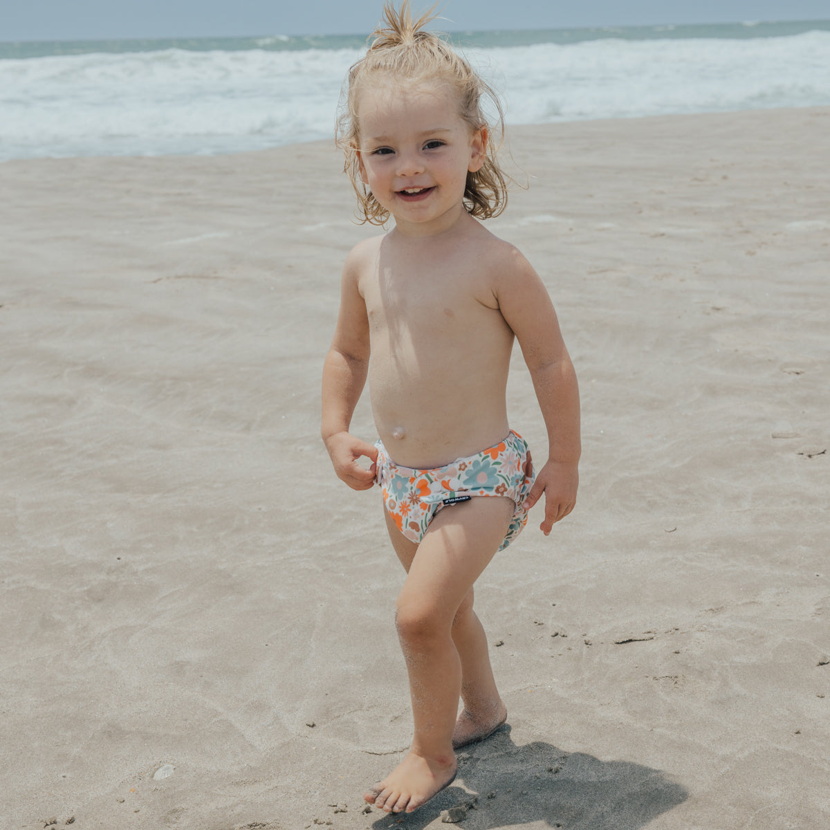 Toddler wearing Cry Wolf Reusable Nappy Flower Market