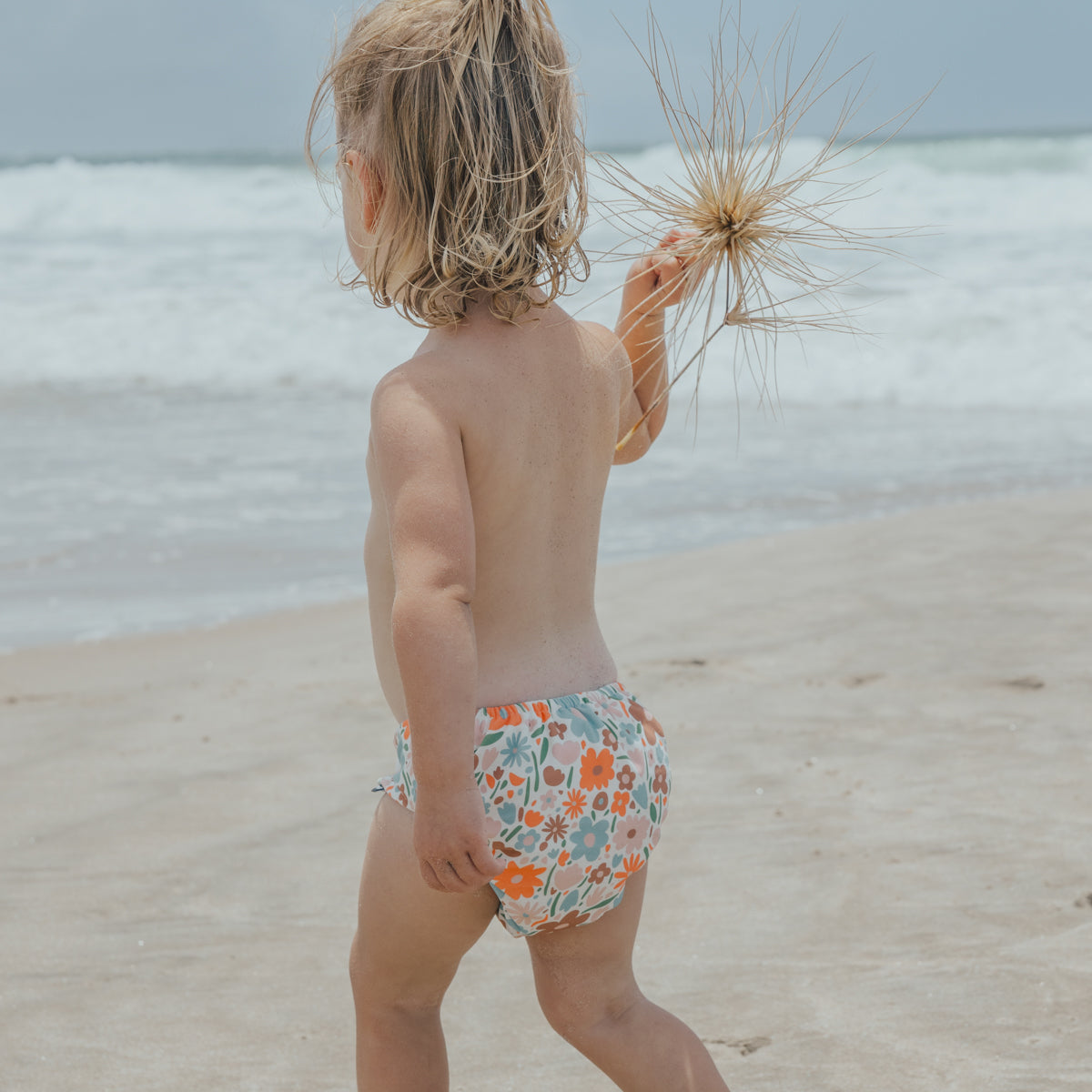 Toddler wearing Cry Wolf Reusable Nappy Flower Market