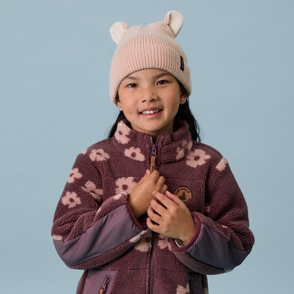 Girl wearing Crywolf Wolf ears beanie and Yeti jacket