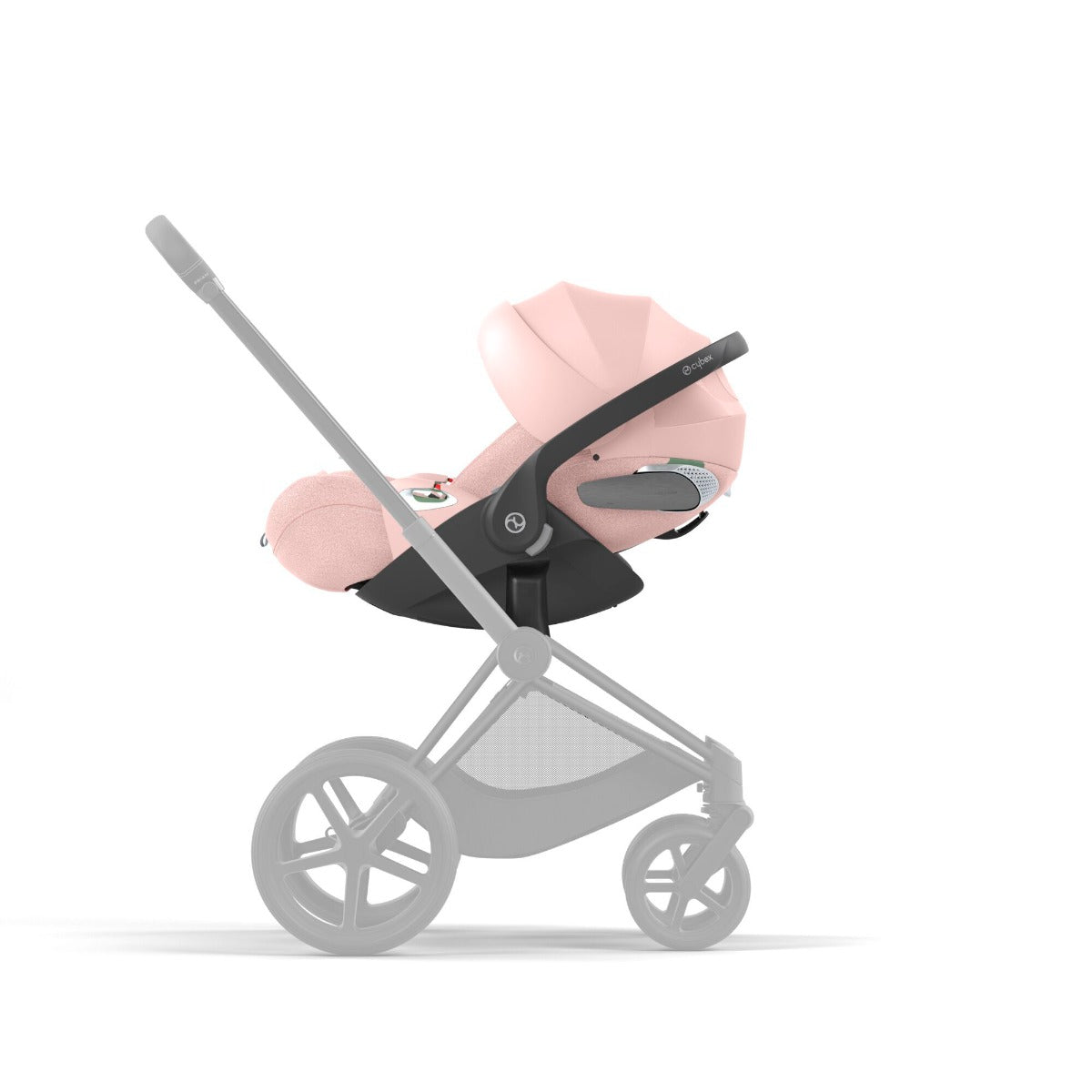 Cybex Cloud T i-size Infant Capsule in peach pink on a stroller