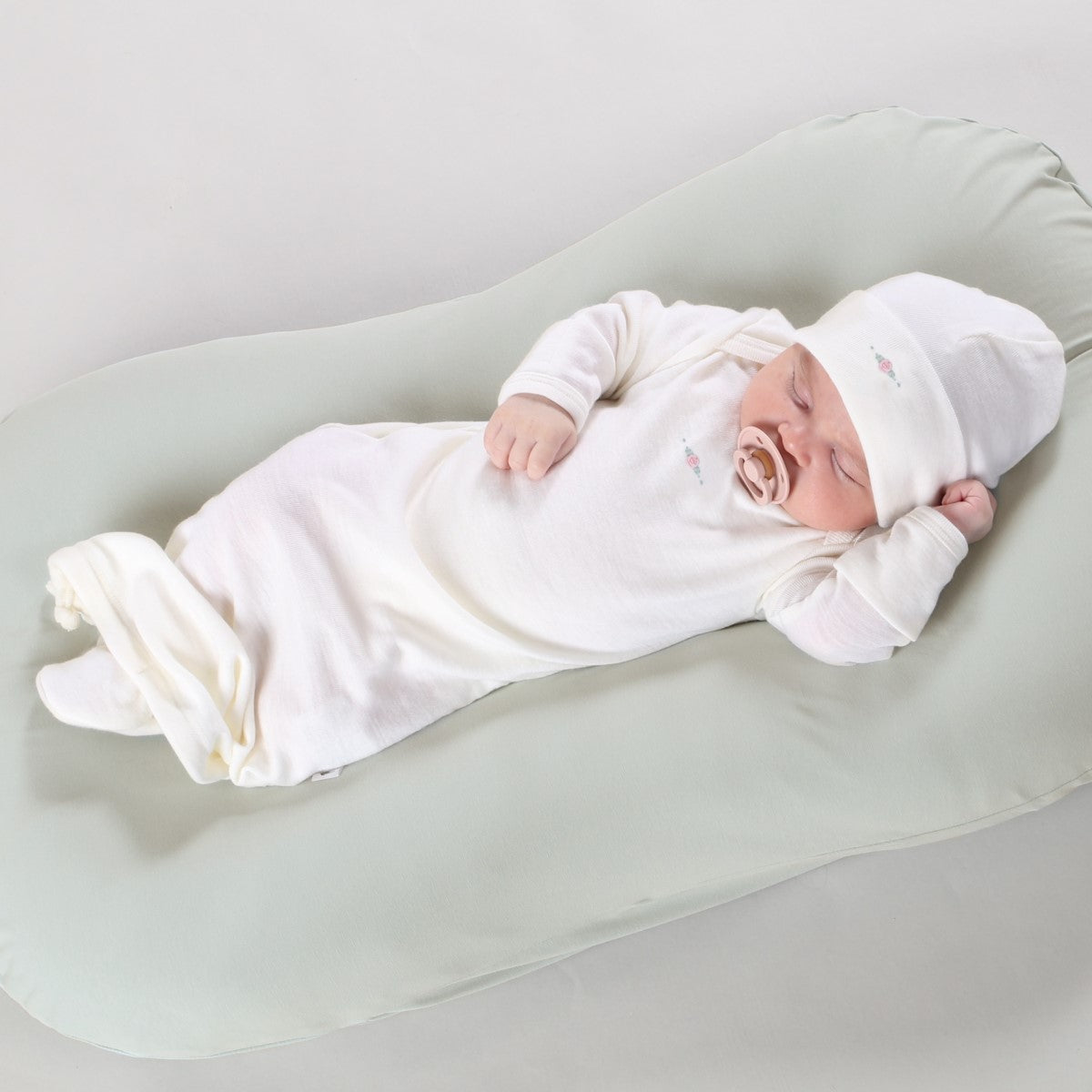 Dimples Classic merino baby sleep gown on sleeping baby