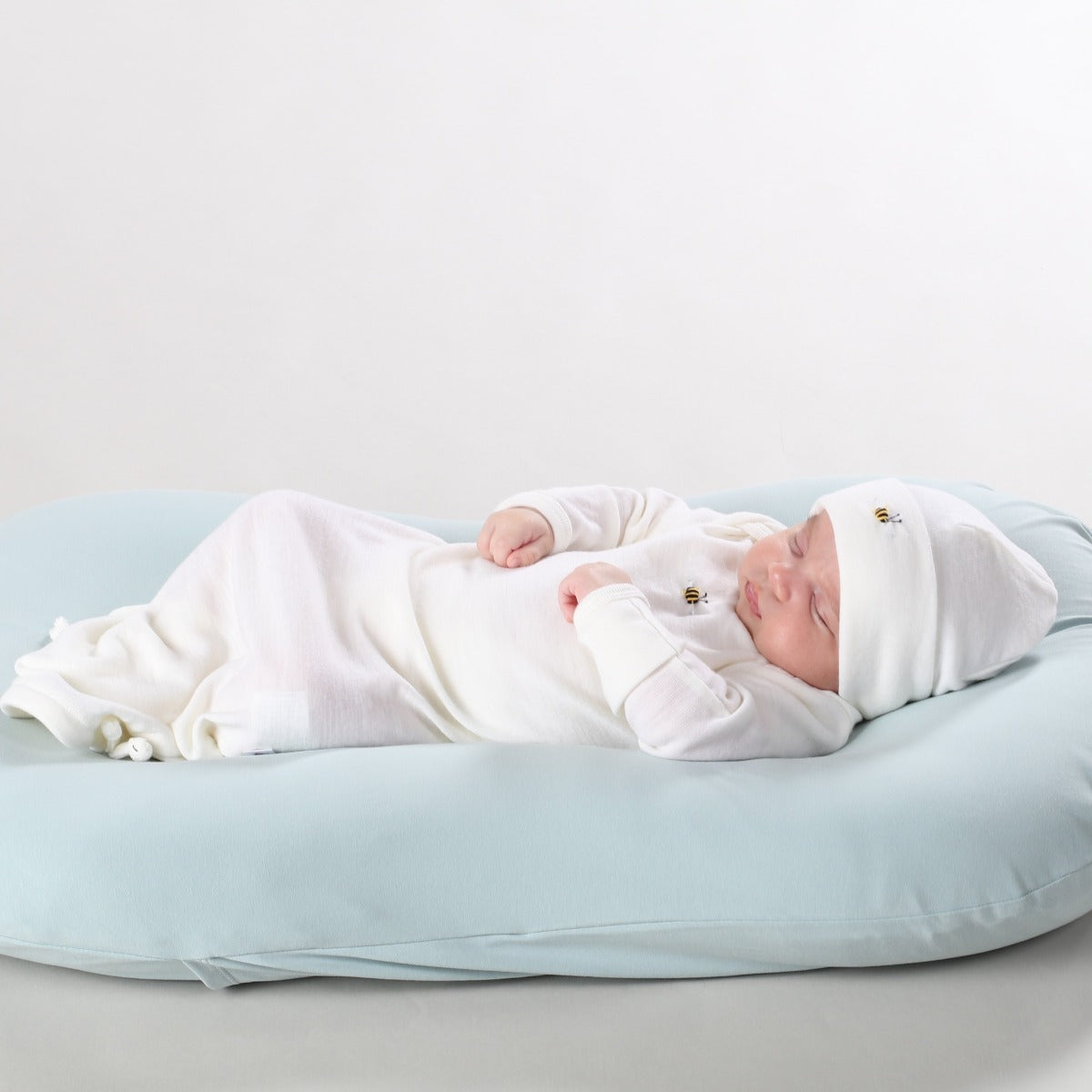 Dimples classic merino baby sleep gown in cream bee on baby