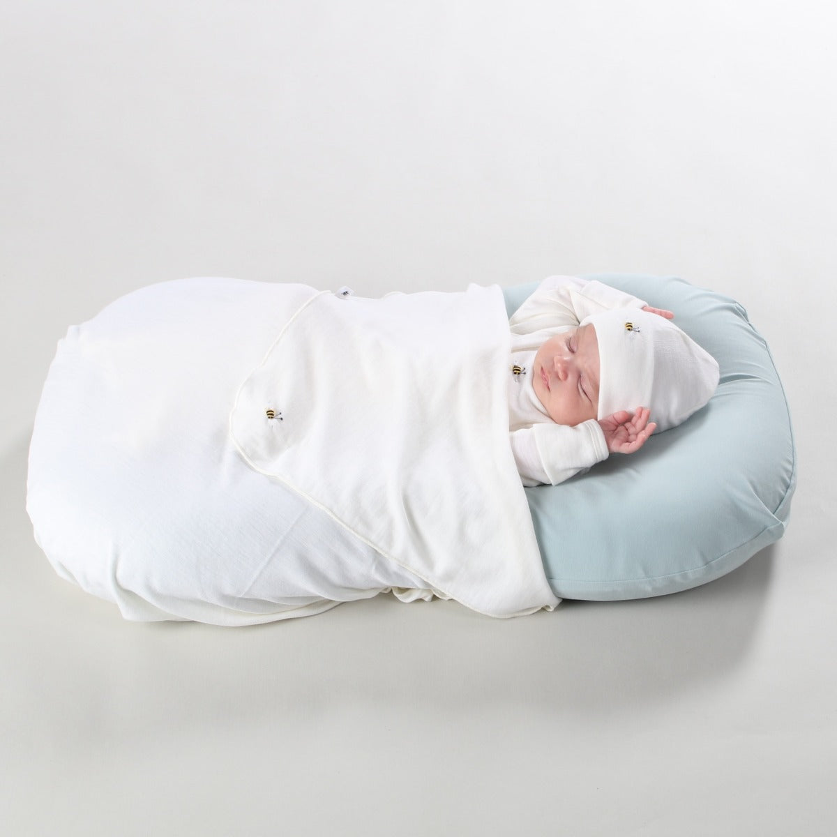 Dimples Classic Merino Extra Large Wrap in Cream Bee as blanket over baby