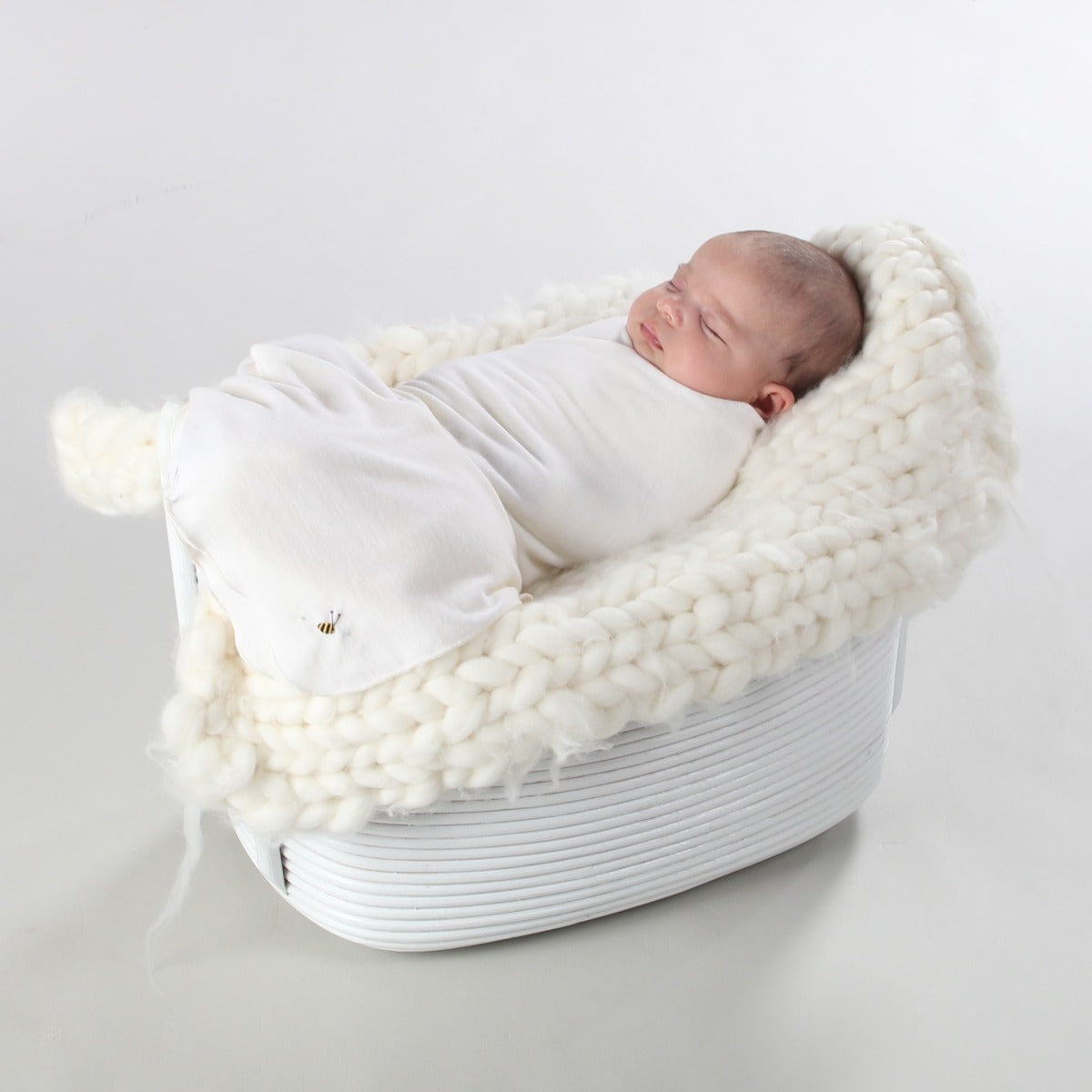 Dimples Classic Merino Extra Large Wrap in Cream Bee on sleeping baby