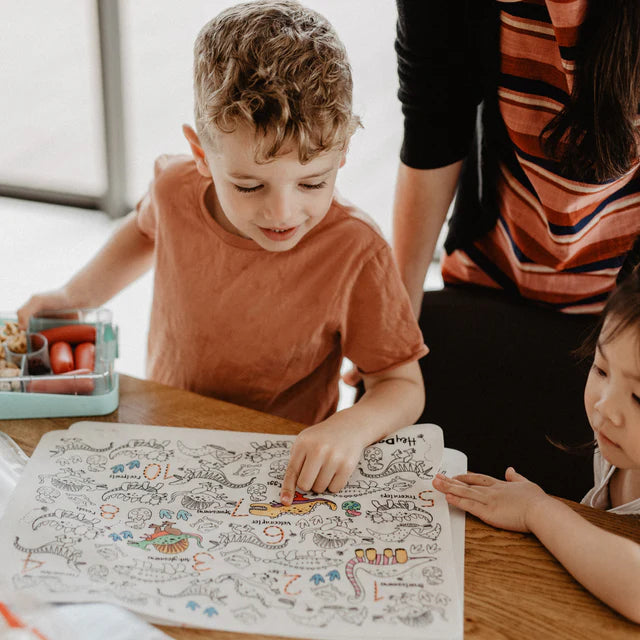 Baby boy colouring on Dinosaurs reusable silicone colouring and doodle mat