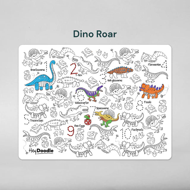 Baby boy colouring on Dinosaurs reusable silicone colouring and doodle mat