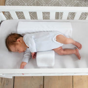 Baby sleeping with Baby positioner