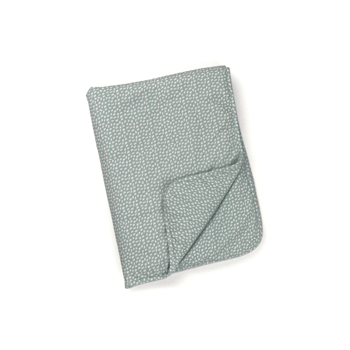 A folded green organic cotton blanket with a subtle star pattern.