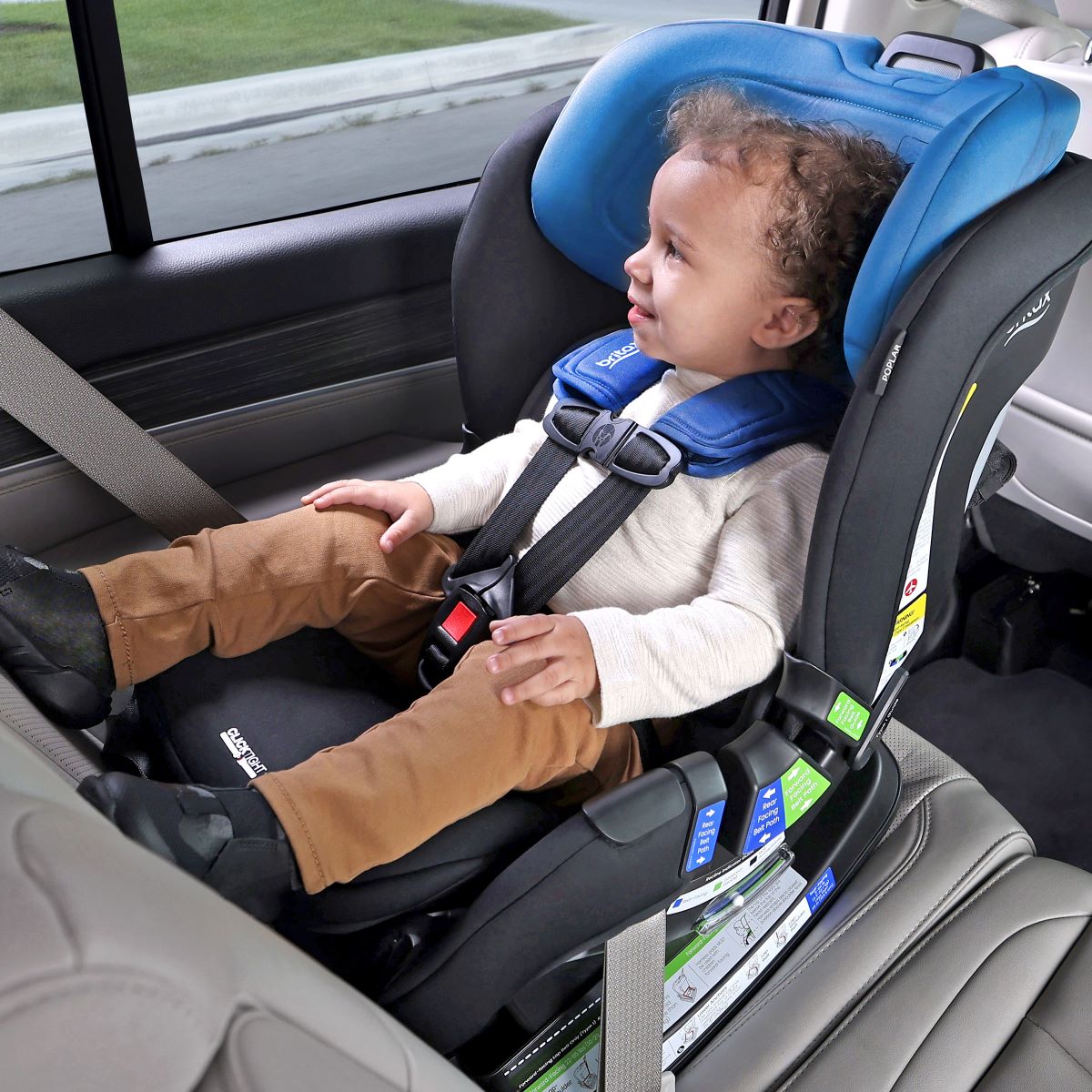 Britax Poplar convertible carseat in cobalt onyx with child