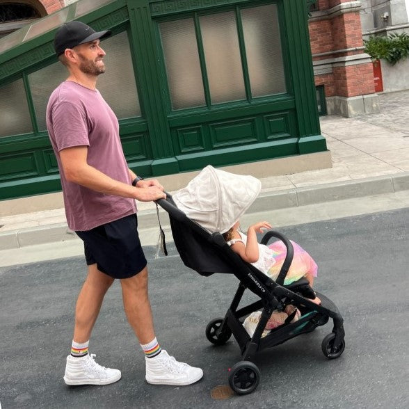 Father with Edwards & co Lucci Stroller in arctic white