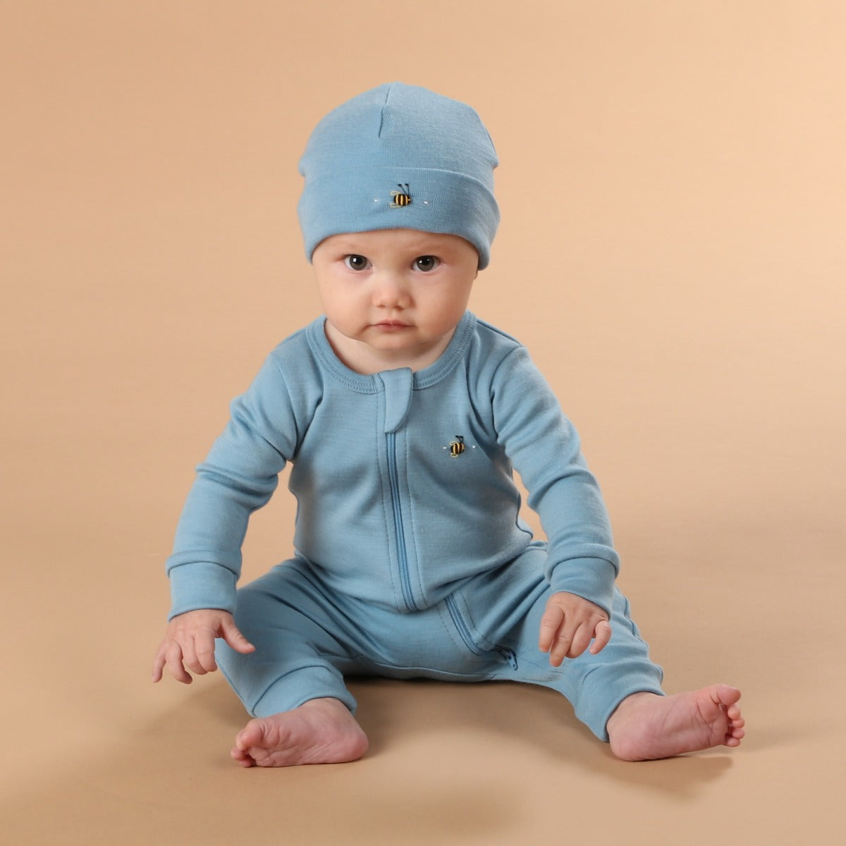dimples fall fiesta merino wool zip babygrow in steel blue