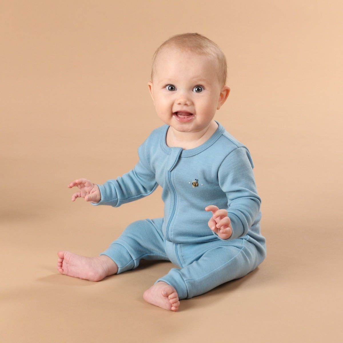 dimples fall fiesta merino wool zip babygrow in steel blue