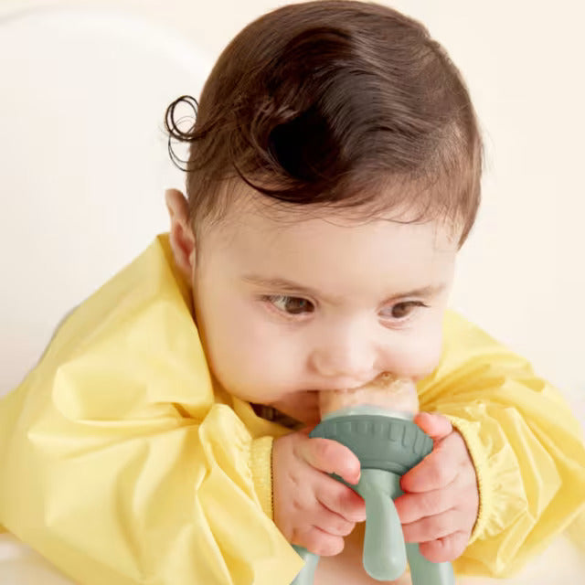 Baby putting Silicone Fresh food feeder in mouth
