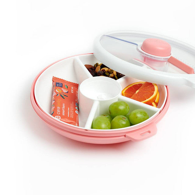 GoBe Large Snack Spinner Coral Pink filled with food