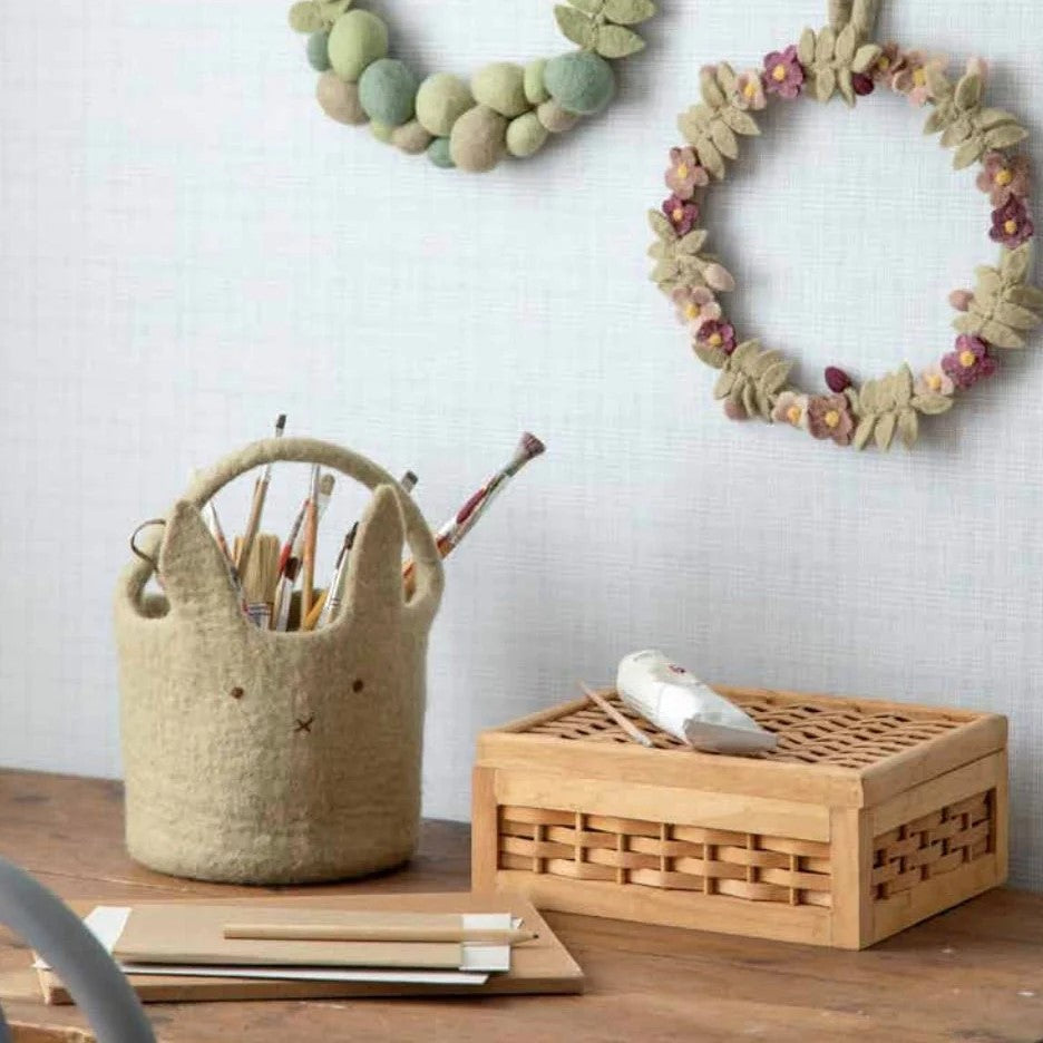 Dusky Green Big Bunny Basket from Gry & Sif on a table filled with stationery