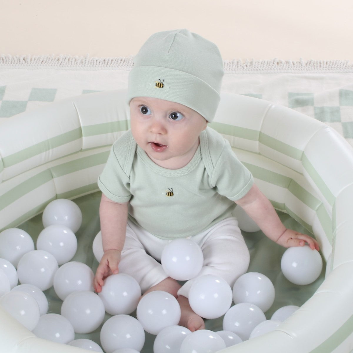 Dimples baby clothing cotton leggings in white on baby 