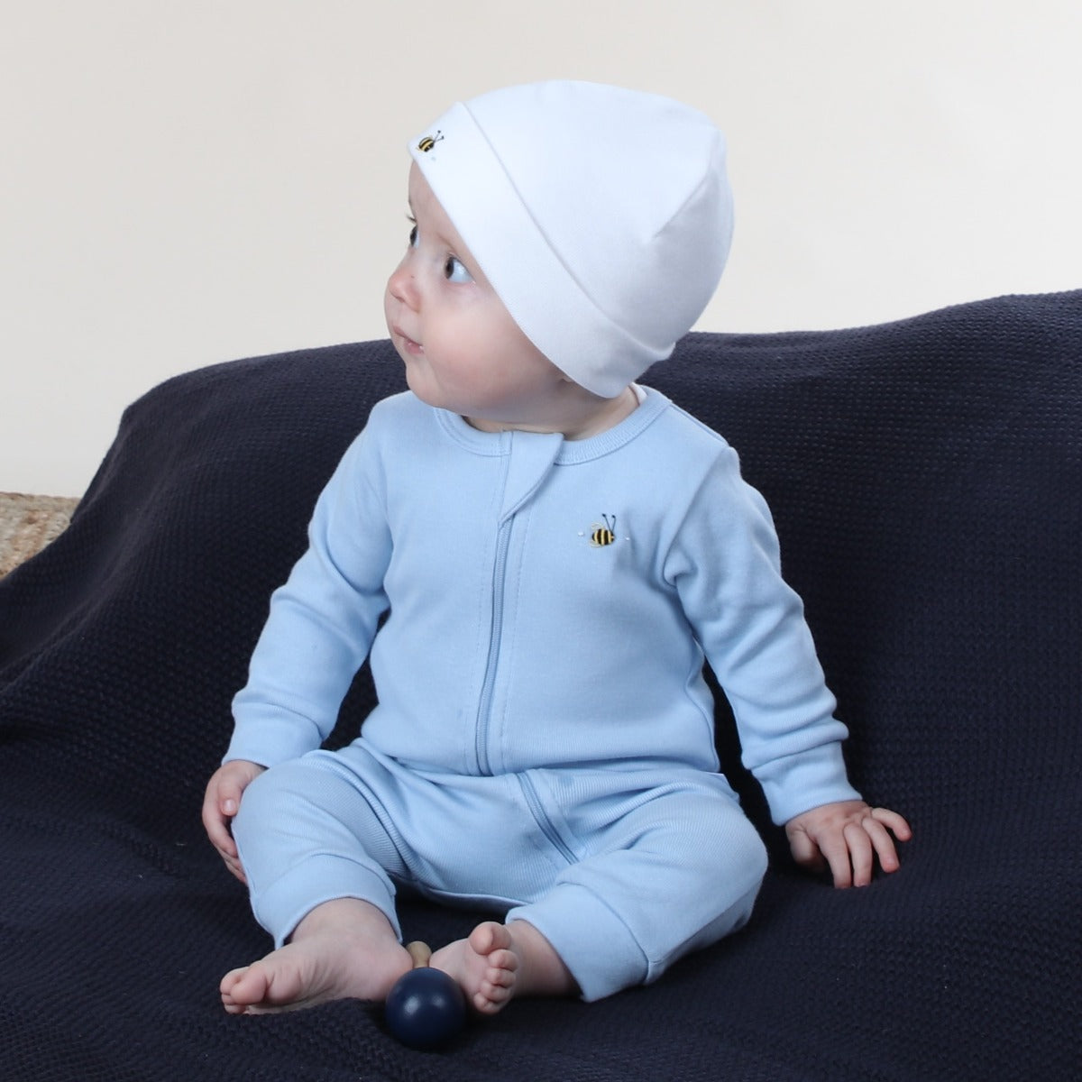 Dimples Baby Clothing cotton zip babygrow in blue  on baby boy 