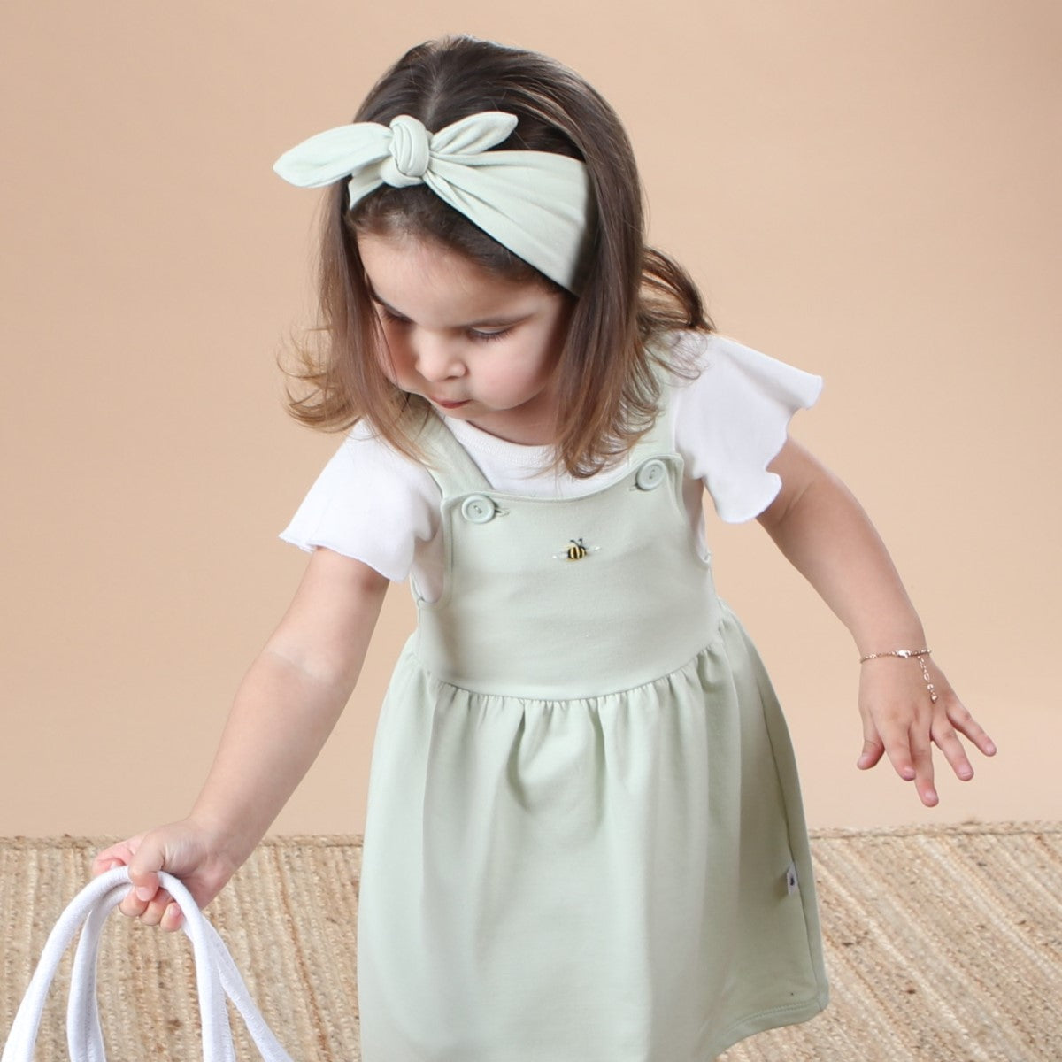 Dimples baby Clothing cotton petal bodysuit in white rose on girl