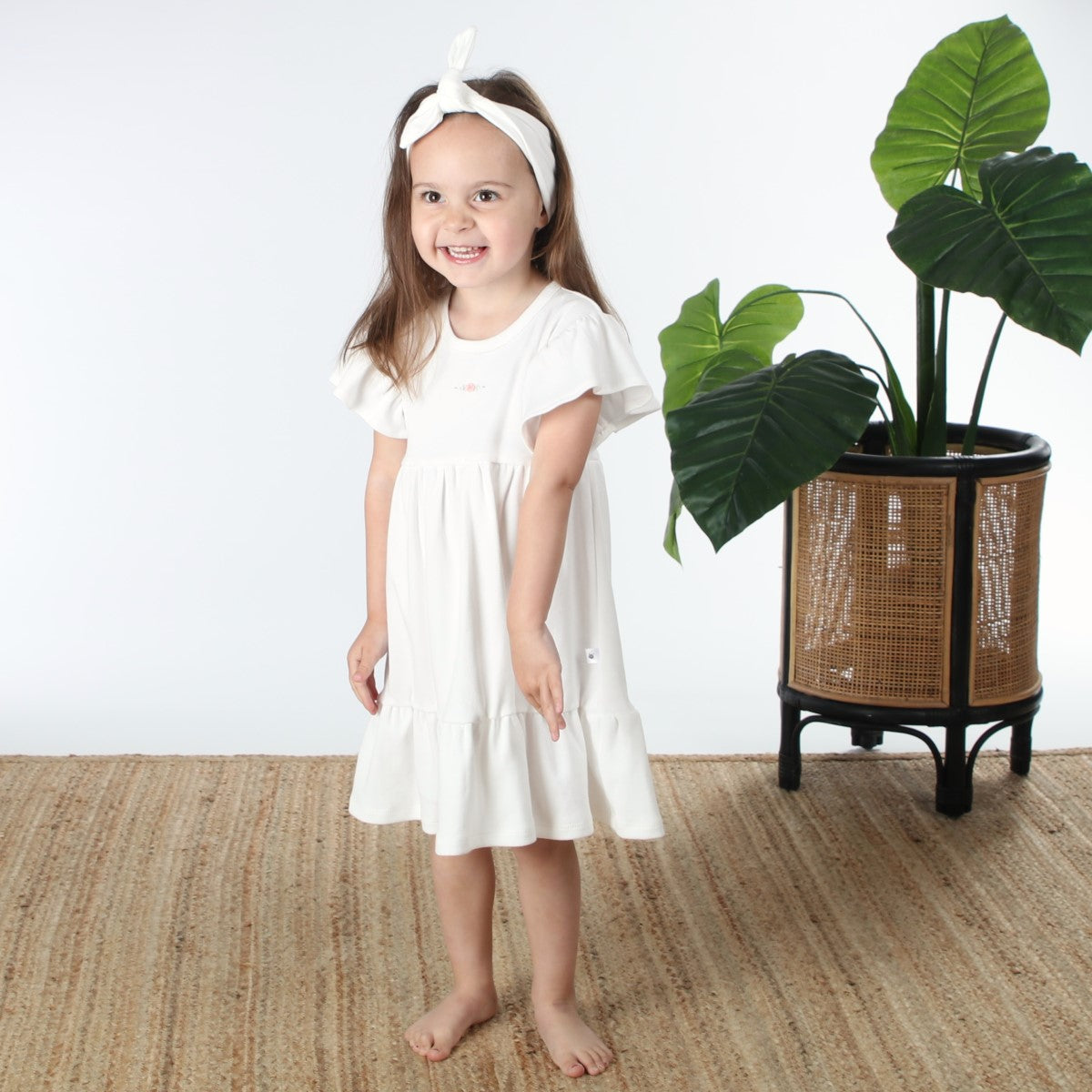 Dimples baby clothing cotton tiered dress in white rose on girl