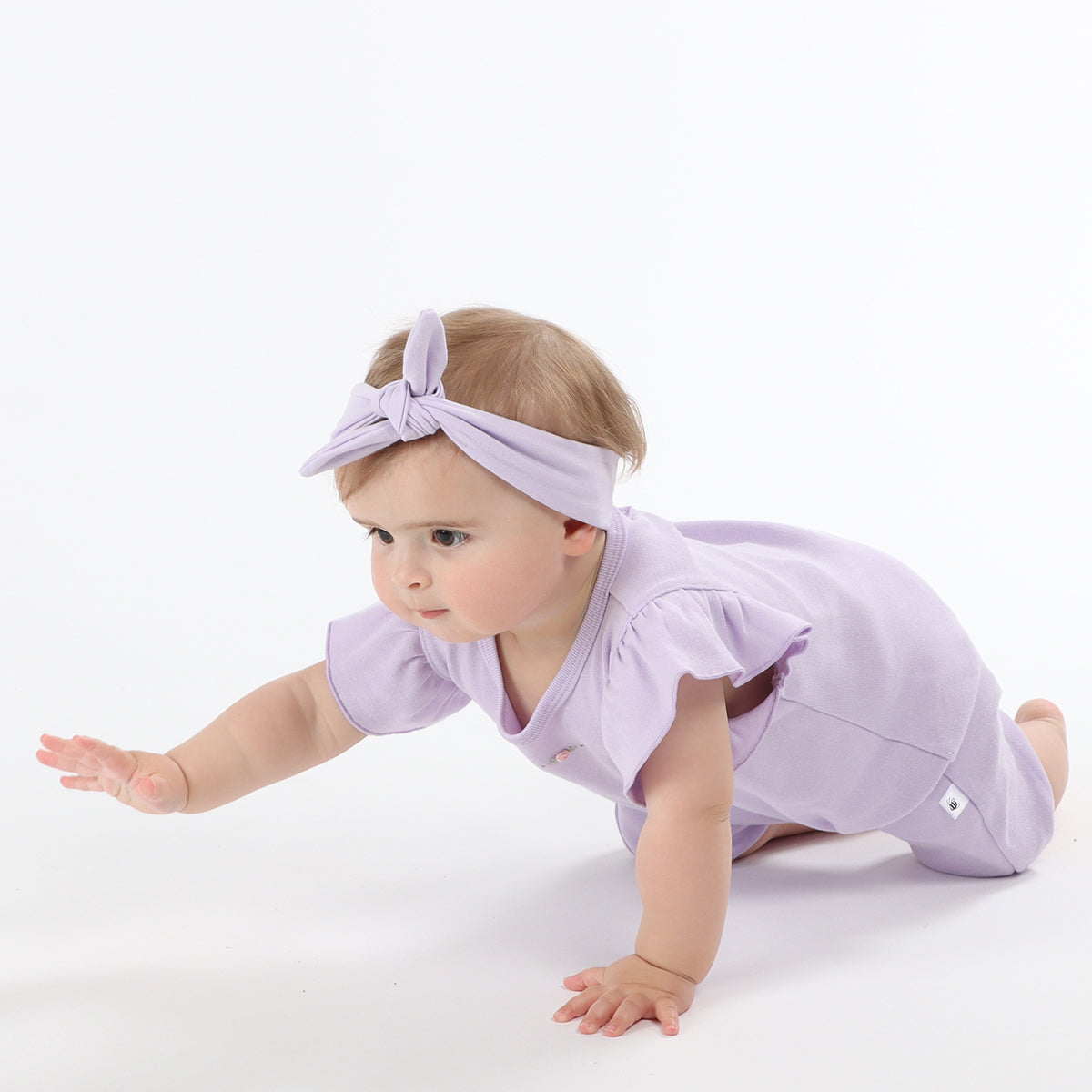 Baby girl wearing Cotton head band in lilac color
