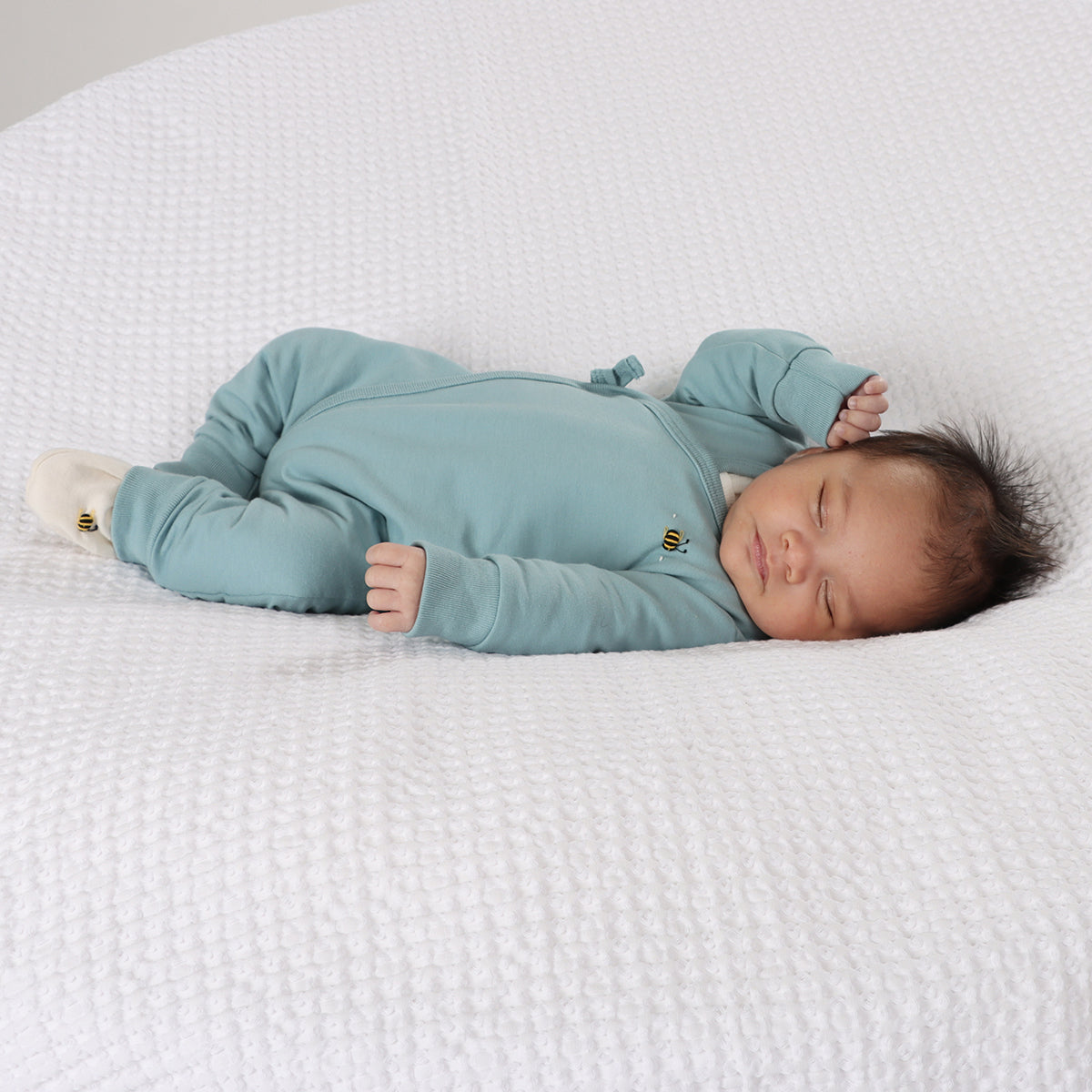 Cotton Tie Baby grow in ocean color with bee embroidery
