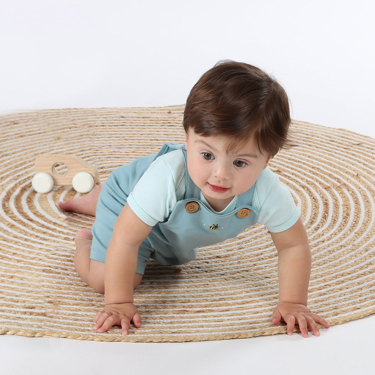 Cotton overall front button for baby boys in ocean color with bee embroidery