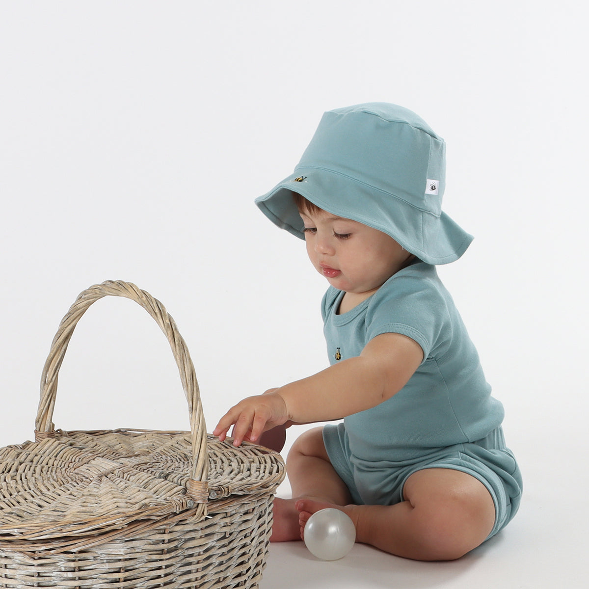 Cotton baby boys shorts in ocean pairing with sunhat and tshirt