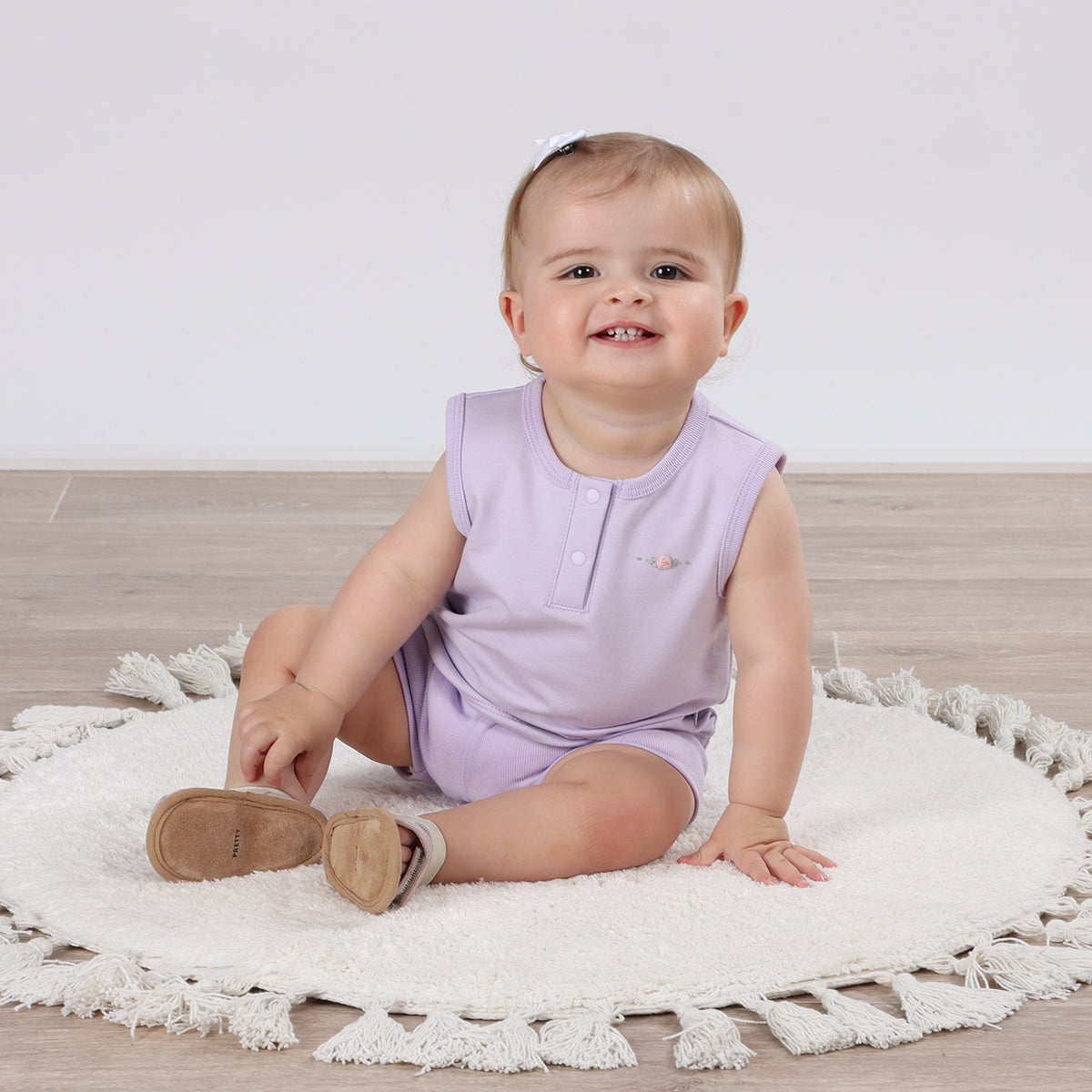 Cotton lilac girls sleeveless top paired with bike shorts