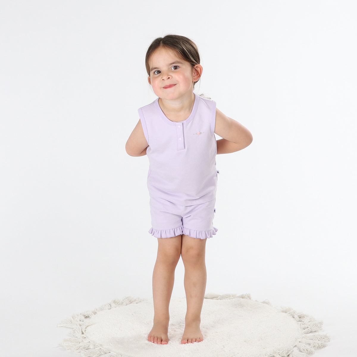 Cotton lilac girls sleeveless top paired with frill shorts