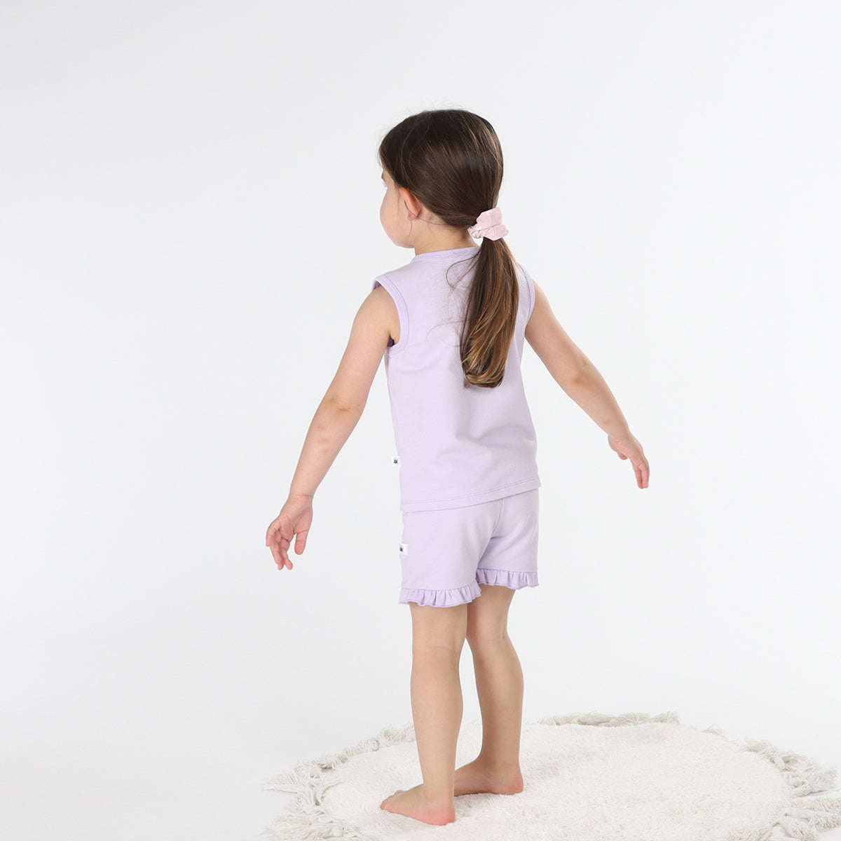 Cotton lilac girls sleeveless top paired with frill shorts