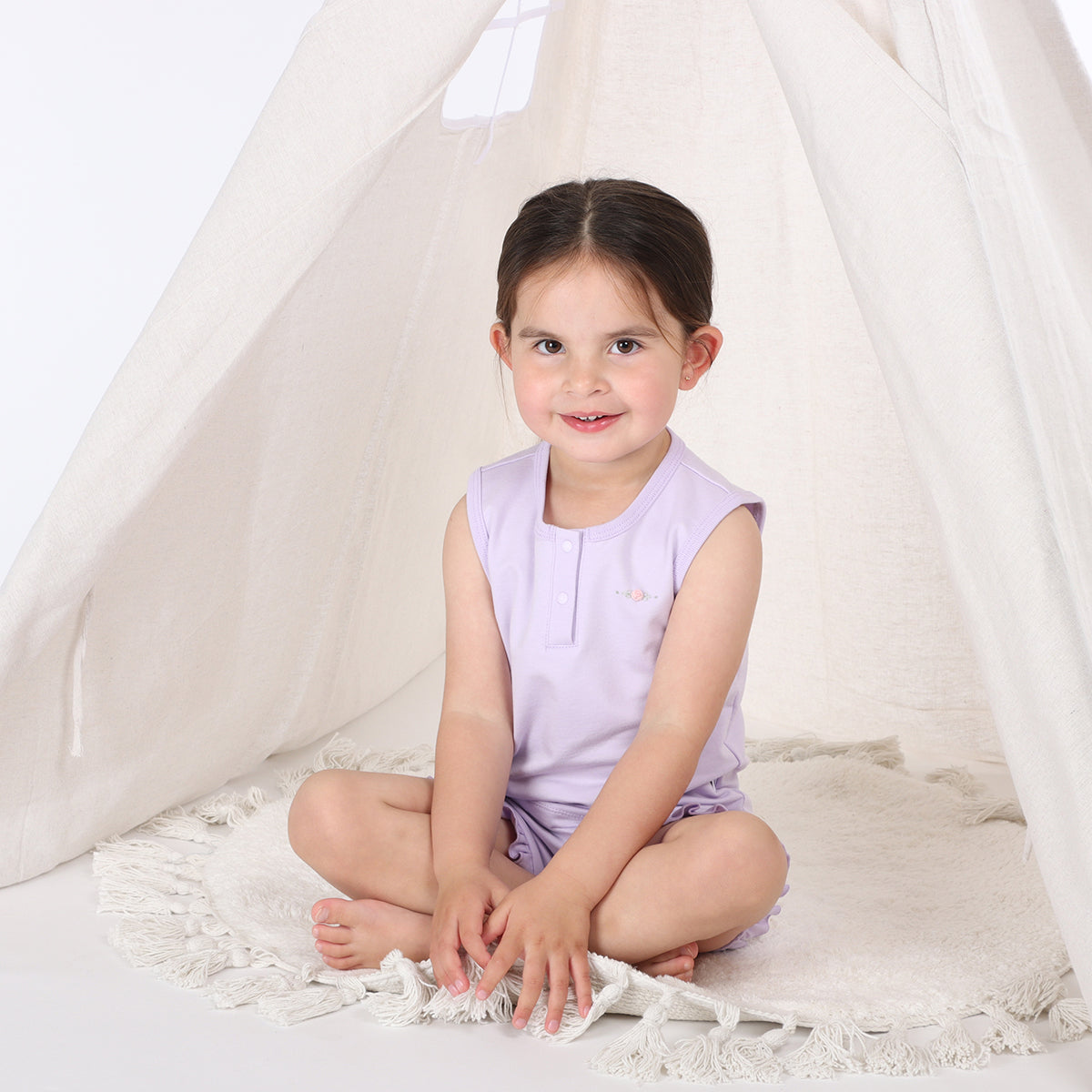 Cotton lilac girls sleeveless top paired with frill shorts