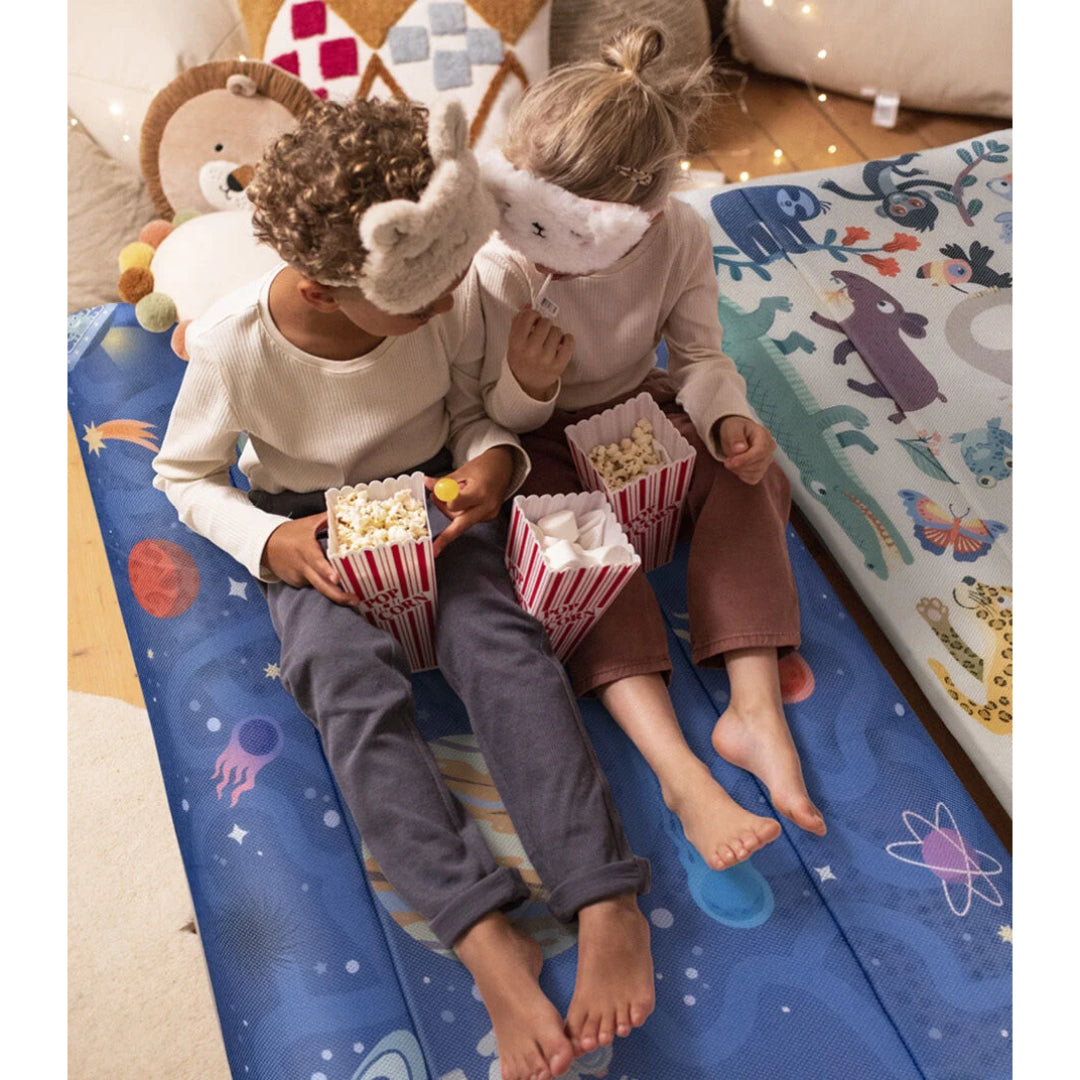 Kids enjoying sleepover on Jetkids Cloudsleepr space print