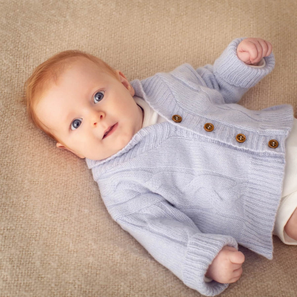 Benmore Cable knit cardigan in sky Blue  on baby