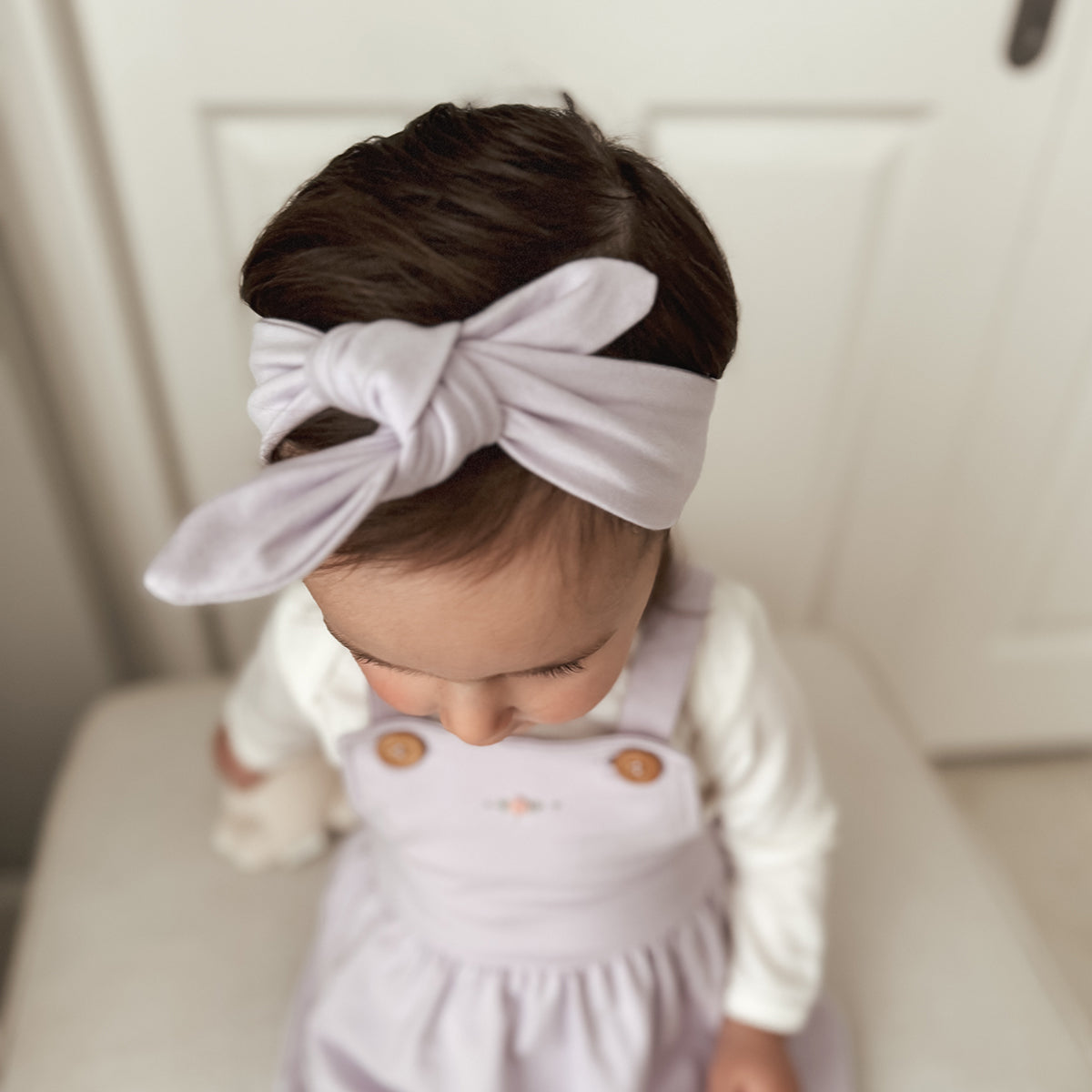 Baby girl wearing Cotton head band in lilac color