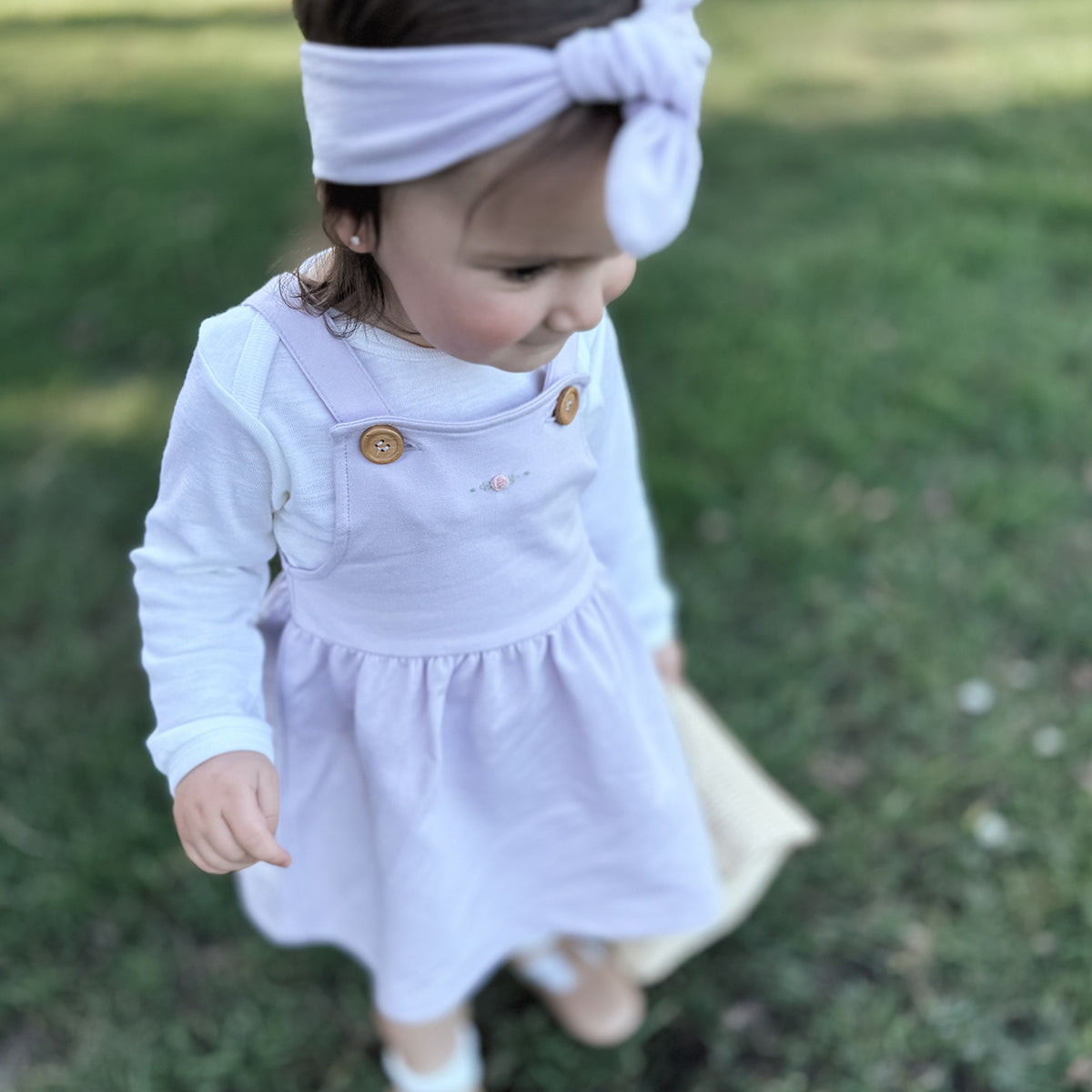 Baby girl wearing Cotton Pinafore dress for girls in lilac with rose embroidery