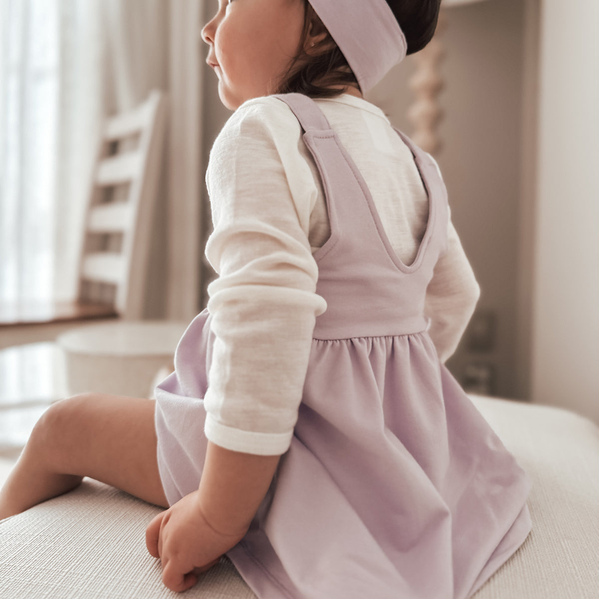 Baby girl wearing Cotton Pinafore dress for girls in lilac with rose embroidery