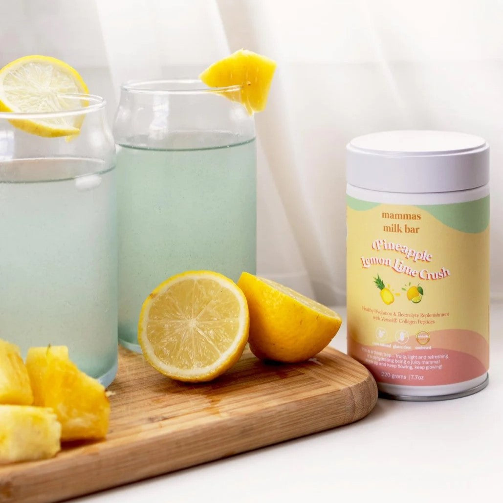 Pineapple Lemon & Lime Hydration & Electrolytes pack and also drink glasses with lemons