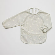 Waterproof long sleeve bib from Over the Dandelions in Daisy print:image,small_image,thumbnail,swatch_image