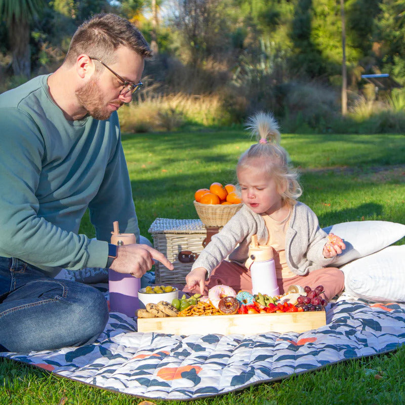 Kids sitting on quilted playmat from Zazi