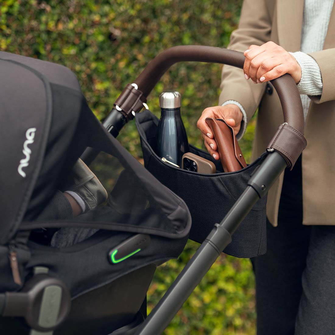 Close look of Nuna Mixx Next Stroller with chocolate handle