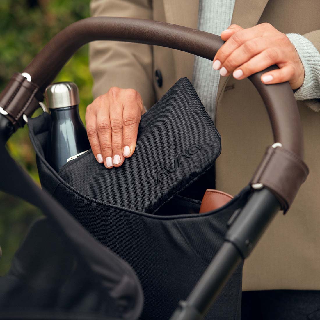 Nuna Stroller organiser in biscotti colour with pouch attached with Mixx Next stroller