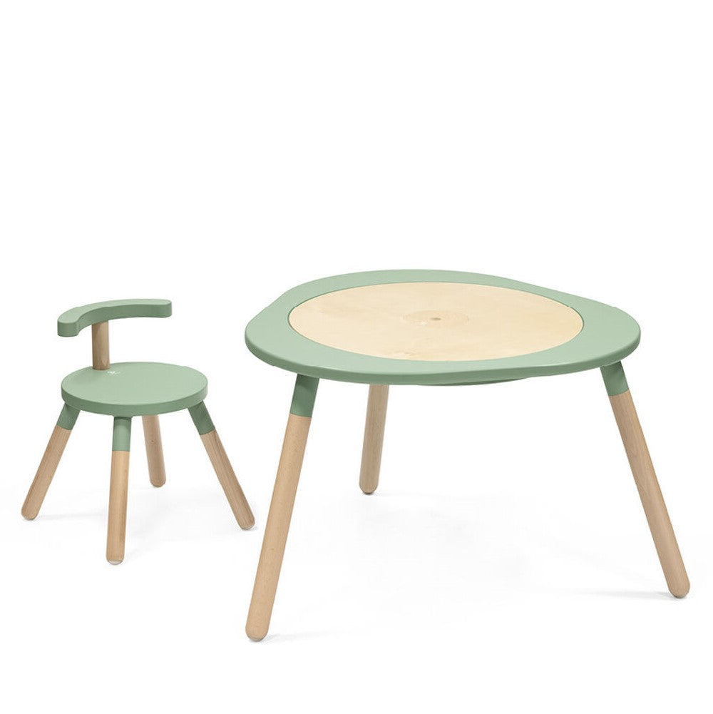 enlarged mutable clover green by stokke alongside matching chair