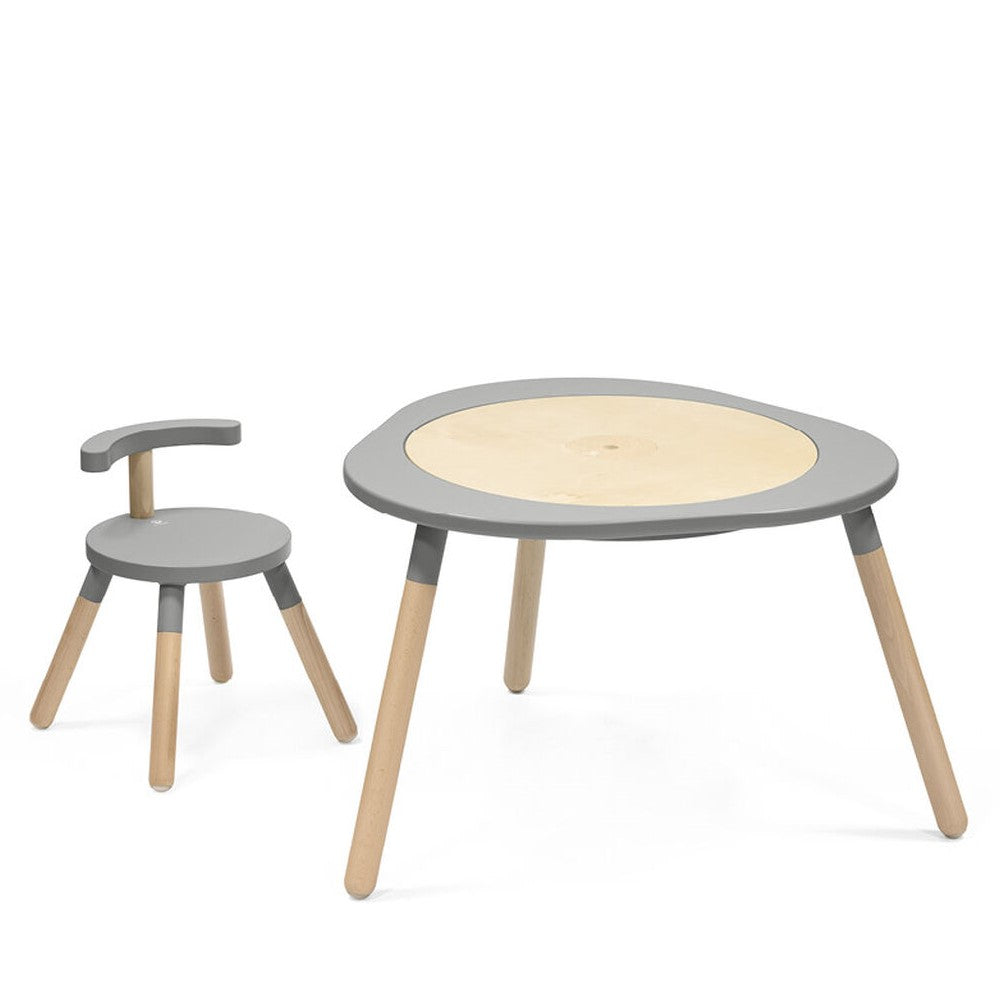 MuTable table in storm grey by stokke with matching chair
