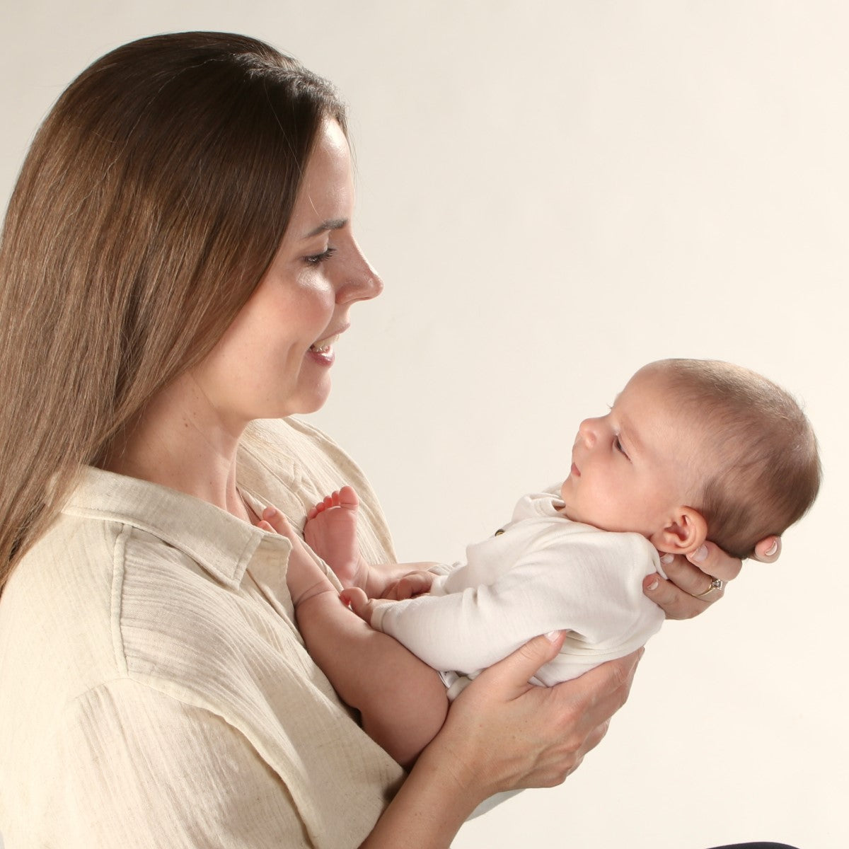 Dimples Cream Bee Merino Bodysuit on Newborn baby